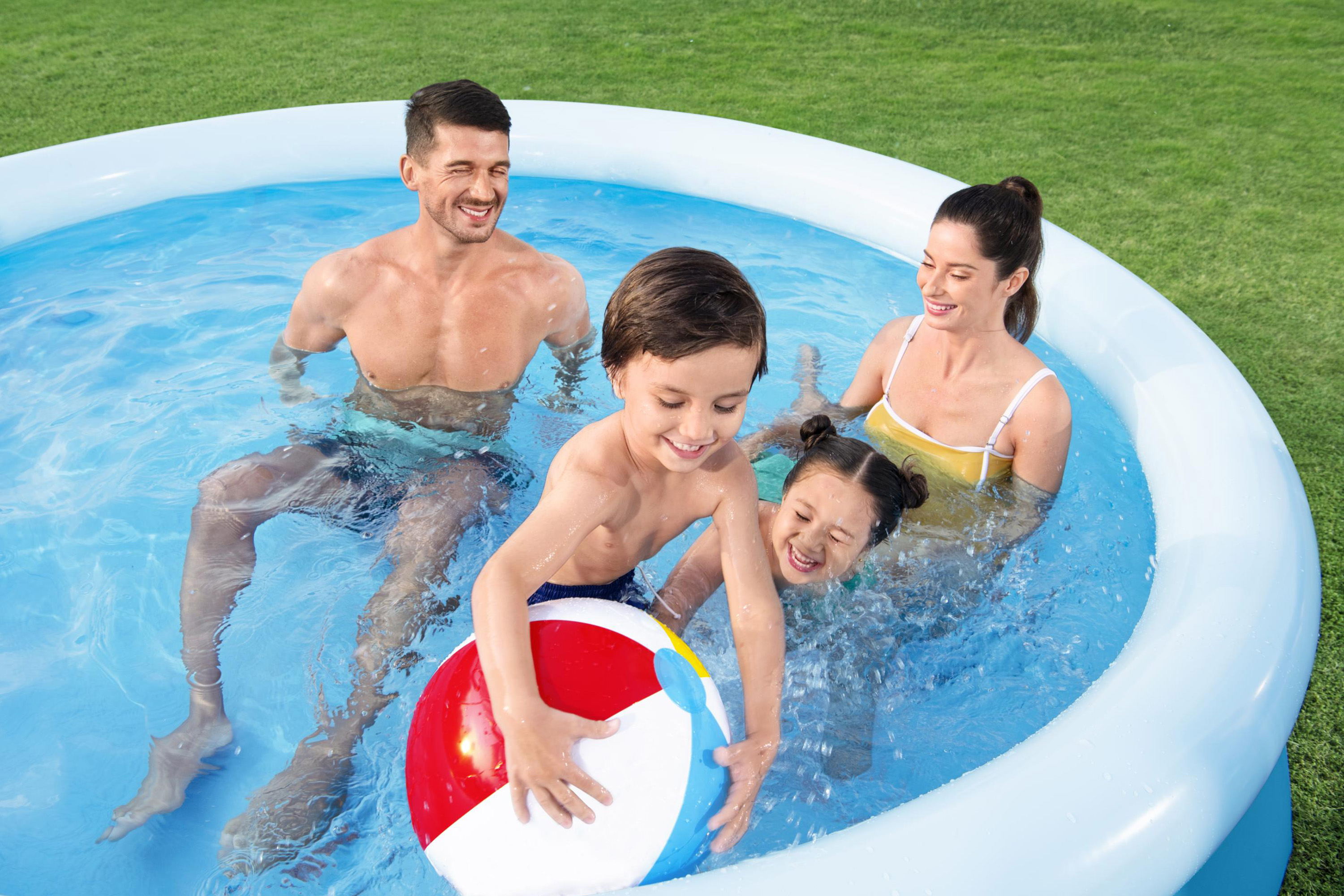 Family in the 10ft paddling pool